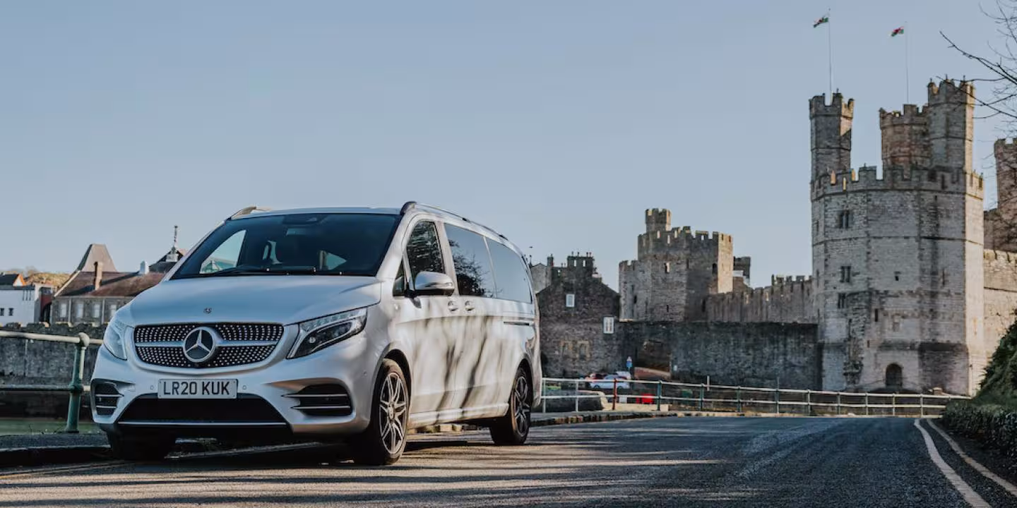 Our new touring vehicle pictured in front of Caernarfon Castle