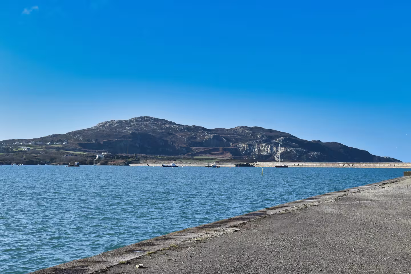 A scenice view of Holyhead Mountain, from the Holyhead breakwater