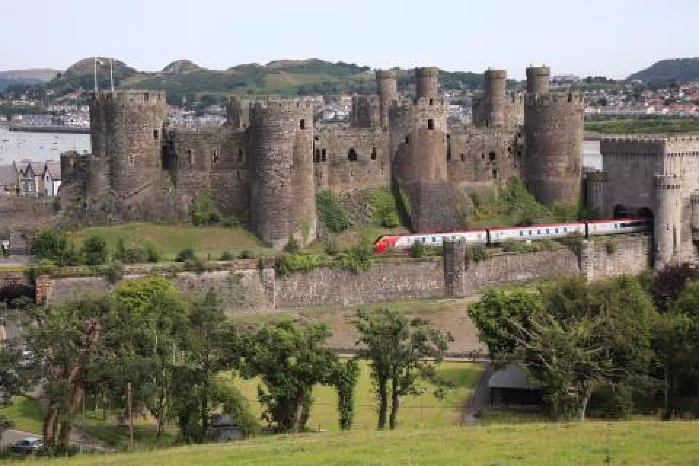 Virgin Train passing Conwy Castle on route to London